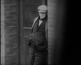 Male Civilians Standing in the Streets, 1926. Creator: British Pathe Ltd.