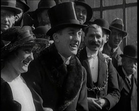 Newlywed Beatrice Lillie Smiling for Cameras With Boxer Georges Carpentier, 1920. Creator: British Pathe Ltd.