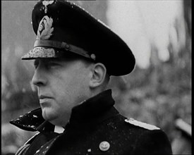 Man in Uniform Listening to a Speech, 1930s. Creator: British Pathe Ltd.