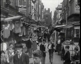 Crowds Milling Around Berwick Street Market, 1930s. Creator: British Pathe Ltd.