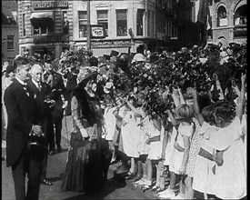 Wilhelmina, Her Majesty the Queen of the Netherlands Taking Flowers from Young Girls, 1930s. Creator: British Pathe Ltd.