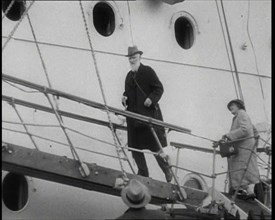 George Bernard Shaw and a Woman Climbing a Gangplank, 1930s. Creator: British Pathe Ltd.