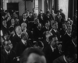 A Large Group of Male and Female Delegates from the League of Nations Sitting in a Room, 1924. Creator: British Pathe Ltd.