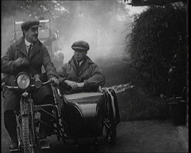 A Motorcycle and Sidecar Pulling up at a Petrol Station for a Refuelling, 1920. Creator: British Pathe Ltd.