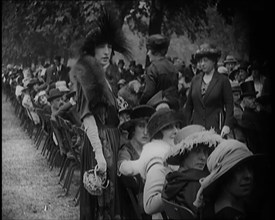 Smartly Dressed Civilians Sitting in Chairs , 1924. Creator: British Pathe Ltd.