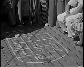 People Enjoying Games on Deck of a Cruise Liner Whilst at Sea, 1931. Creator: British Pathe Ltd.