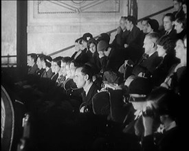 A Crowd of People Watching Actors Performing on Stage in a Theatre, 1931. Creator: British Pathe Ltd.