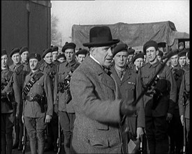 A British Man Inspecting and Speaking to Lines of Irish Auxiliary Soldiers, 1921. Creator: British Pathe Ltd.