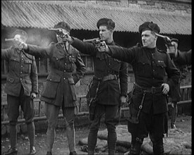 British Officers Firing Revolvers at Targets, 1921. Creator: British Pathe Ltd.