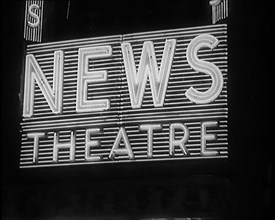 Illuminated Sign. Sign Reads: 'News Theatre', 1931. Creator: British Pathe Ltd.