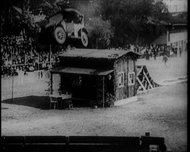 A Motorcar Jumping Over a Wooden Shack, 1920. Creator: British Pathe Ltd.