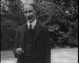 Lord Privy seal Andrew Bonar Law Standing in a Garden, 1921. Creator: British Pathe Ltd.