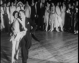 Female Civilian and Male Civilian Dancing in Front of a Crowd of People, 1926. Creator: British Pathe Ltd.