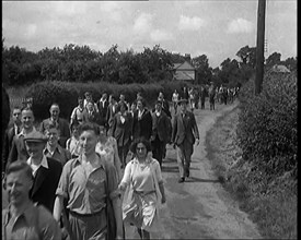 A Large Group of Hikers Walking in the Countryside, 1931. Creator: British Pathe Ltd.