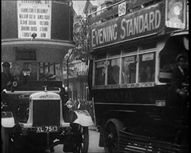 Buses Driving by in London, 1922. Creator: British Pathe Ltd.