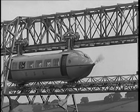 The George Bennie Railplane Driven by a Propeller at Each End Moving Along a Suspended Mono..., 1931 Creator: British Pathe Ltd.