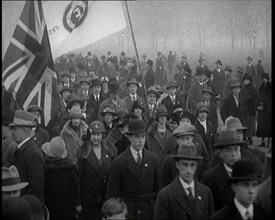 A Crowd of People Carrying Flags. Flags read  'British Fascists', 1924. Creator: British Pathe Ltd.