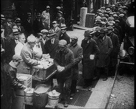 Men Getting Soup from a Soup Kitchen, 1933. Creator: British Pathe Ltd.