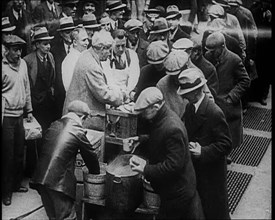 Men Getting Soup from a Soup Kitchen, 1933. Creator: British Pathe Ltd.