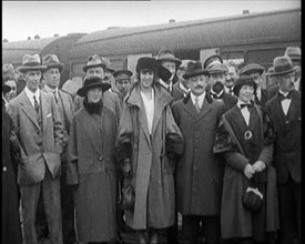 Sinn Fein Delegates Standing by a Train After Arriving in London, 1922. Creator: British Pathe Ltd.