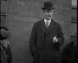 Man in a Bowler Hat Speaking to Crowds, 1920. Creator: British Pathe Ltd.