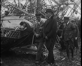 Chief Marshal Sir John Salmond and Other British Officials Walking Around the Wreckage..., 1930. Creator: British Pathe Ltd.