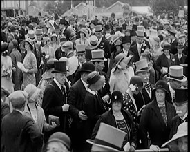 A Large Crowd of Smartly Dressed People in Hats at Ascot Horse Racing Track, 1931. Creator: British Pathe Ltd.