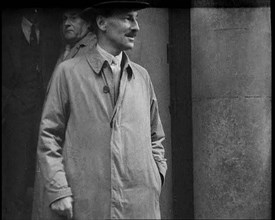 Clement Attlee Standing Outside a Building, 1930s. Creator: British Pathe Ltd.