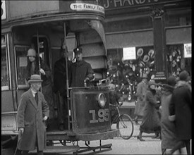 Volunteer Male Civilian Conducting a Tram With a Police Escort Sitting Beside Him, 1926. Creator: British Pathe Ltd.