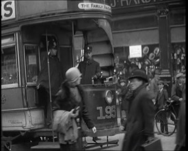 Volunteer Male Civilian Conducting a Tram With a Police Escort Sitting Beside Him, 1926. Creator: British Pathe Ltd.