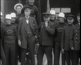 Sir Thomas Lipton Standing With the Crew of the Ship 'The Shamrock', 1920. Creator: British Pathe Ltd.