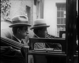 President of the Irish Republic Eamon De Valera Getting Into a Motorcar With a British Man..., 1921. Creator: British Pathe Ltd.