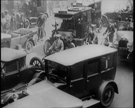 Streets Filled With Heavy Traffic and Pedestrians in London, 1926. Creator: British Pathe Ltd.