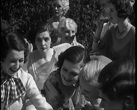 A Large Group of Female Civilians Posing for Photos, 1931. Creator: British Pathe Ltd.