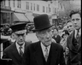 John D Rockefeller in a Suit and Hat Getting Out of a Car, 1932. Creator: British Pathe Ltd.