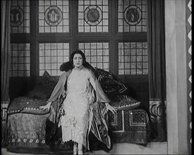 The Female Actor Josie Collins Performing in  a Play With Two Male Actors, 1920s. Creator: British Pathe Ltd.