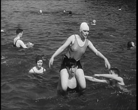 People Playing in the Sea, 1930s. Creator: British Pathe Ltd.