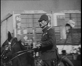 Close up of a Male Japanese Military Officer on Horseback Riding Along a Road During..., 1938. Creator: British Pathe Ltd.