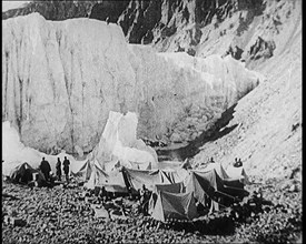 Tents and Groups of Civilians at a Base Camp at the Foot of Mount Everest, 1924. Creator: British Pathe Ltd.