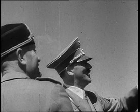 Adolf Hitler, the German Leader, and Benito Mussolini, the Italian Leader, talking, 1937. Creator: British Pathe Ltd.