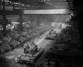 Russian Tanks Being Driven Out of a Factory, 1941. Creator: British Pathe Ltd.