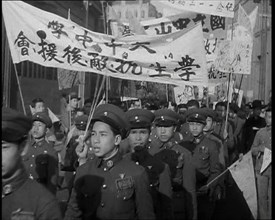 A Close up of Male Chinese Soldiers at an Anti-War Protest Many of Whom Are Carrying..., 1938. Creator: British Pathe Ltd.