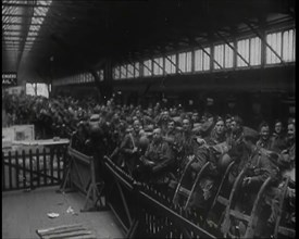 Male Members of the British Expeditionary Force Waiting at  a Large Railway Station Before..., 1939. Creator: British Pathe Ltd.