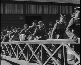 Male British Expeditionary Force Soldiers Walking up the Gangplank of a Ship in a British..., 1939. Creator: British Pathe Ltd.