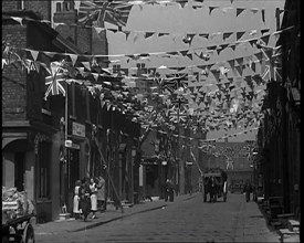 A Street is Decorated With Bunting For the Coronation of George VI, 1937. Creator: British Pathe Ltd.