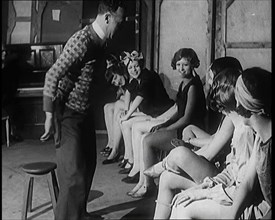 A Group of Dancers in Training Doing Exercises, 1920s. Creator: British Pathe Ltd.