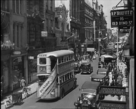 Traffic and Crowds Moving Through Old Bond Street, 1930s. Creator: British Pathe Ltd.