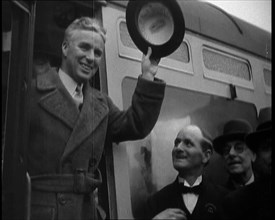 Charlie Chaplin Greeting Onlookers from a Train, 1930s. Creator: British Pathe Ltd.