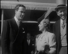 Actors Mary Pickford, her Husband Charles 'Buddy' Rogers, and Noel Coward at  a Theatrical..., 1939. Creator: British Pathe Ltd.