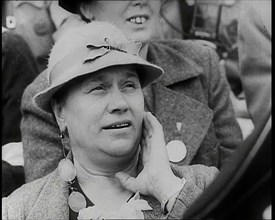 A Czech Woman in a Crowd in a Street Holding Her Left Hand up to Her Face, 1939. Creator: British Pathe Ltd.